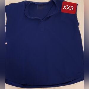 Used figs Rafaela scrub top ,XXS,Electric blue.In good condition
